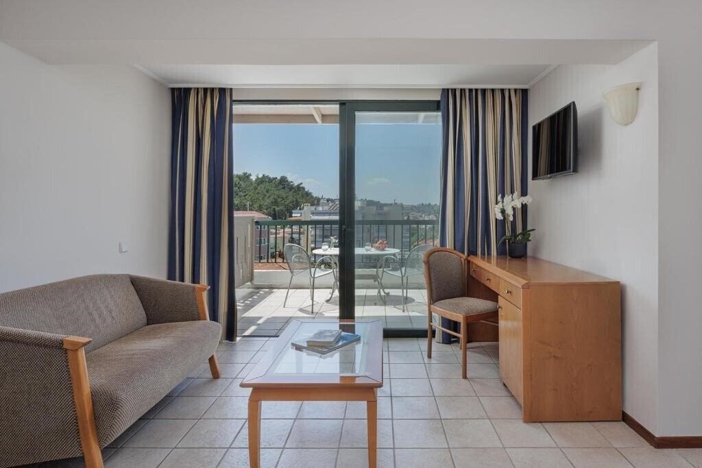 Фотография Sun Beach Agia Triada 4*