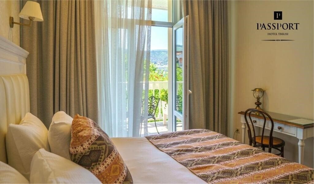 Картинка Passport Hotel 4*