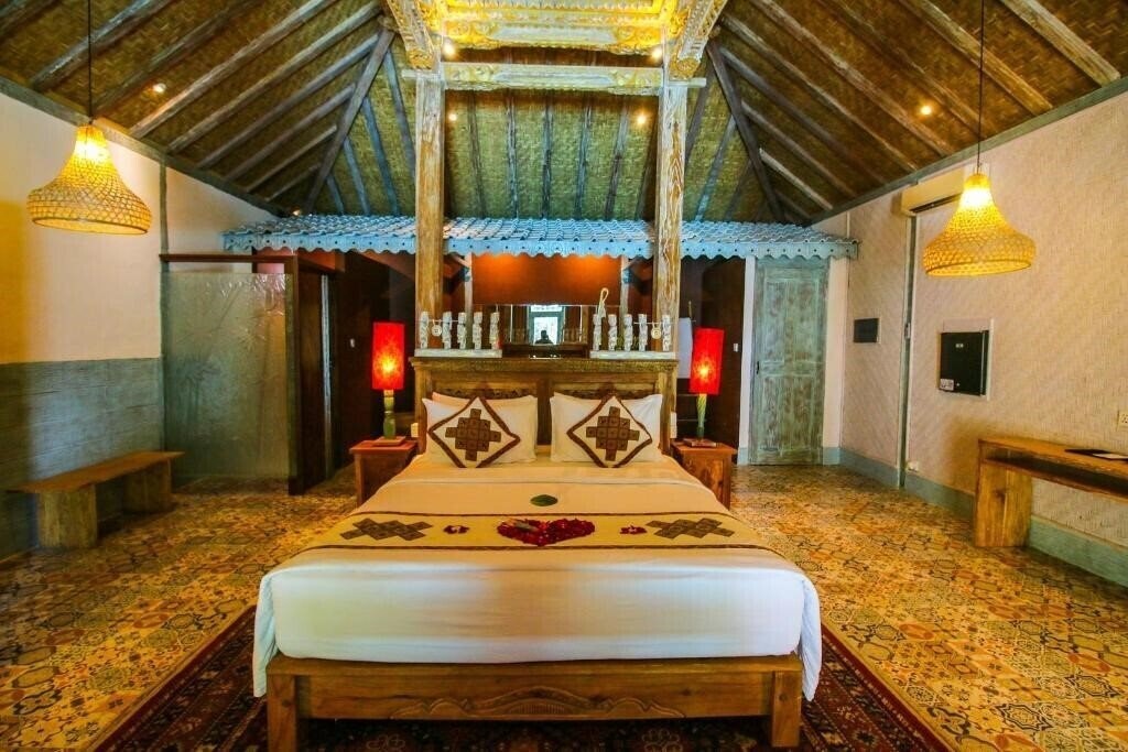 Отель Kupu Kupu Jimbaran Beach Hotel & SPA by L'Occitane 5*