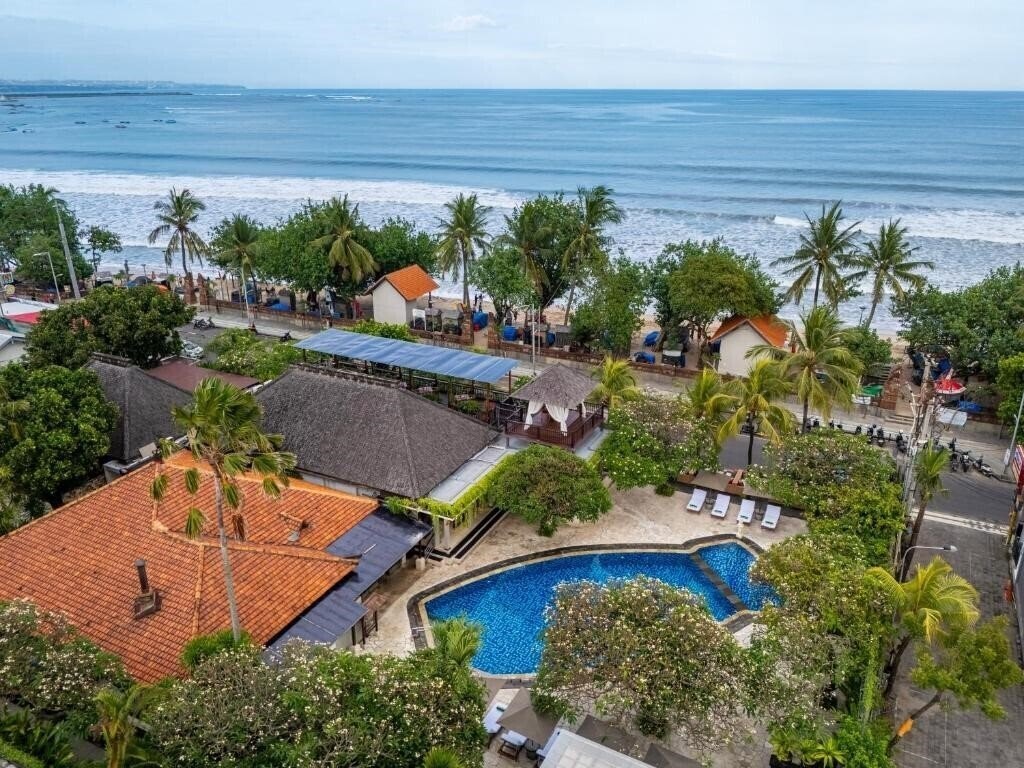Отель Kuta Seaview Cottage 4*