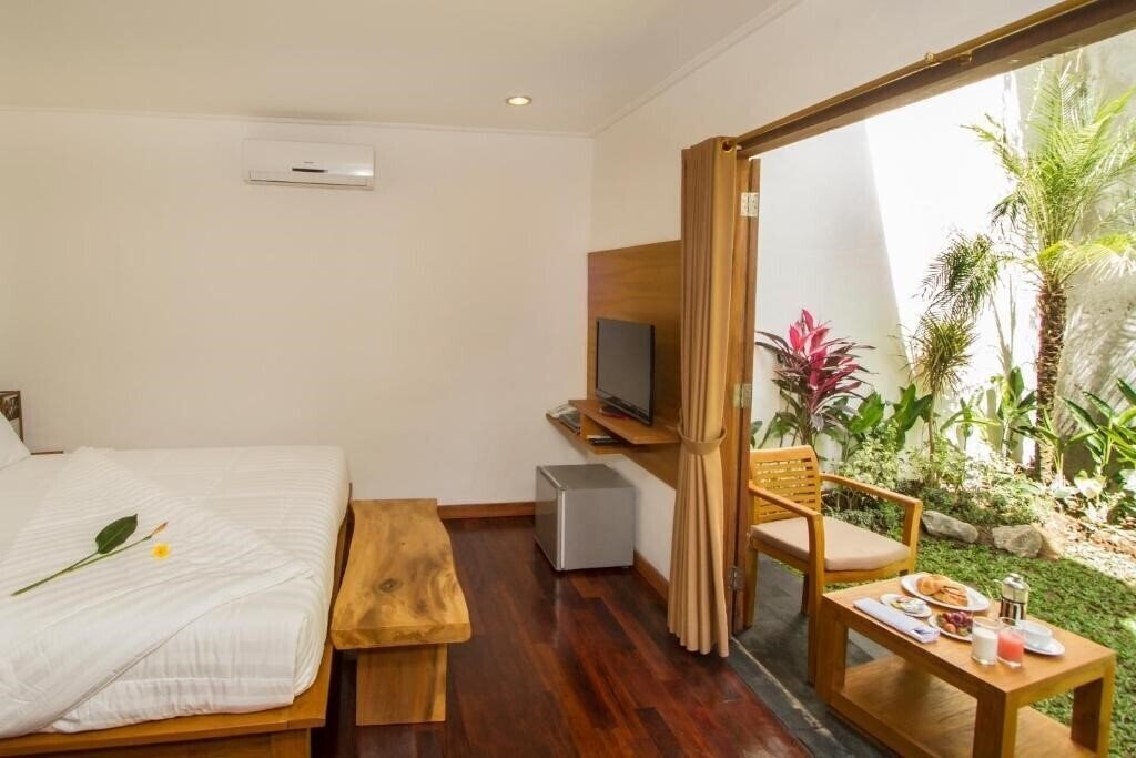 Фото De'Lu Villas And Suites 1*