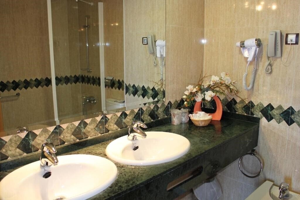 Отель La Familia Gallo Rojo 4*