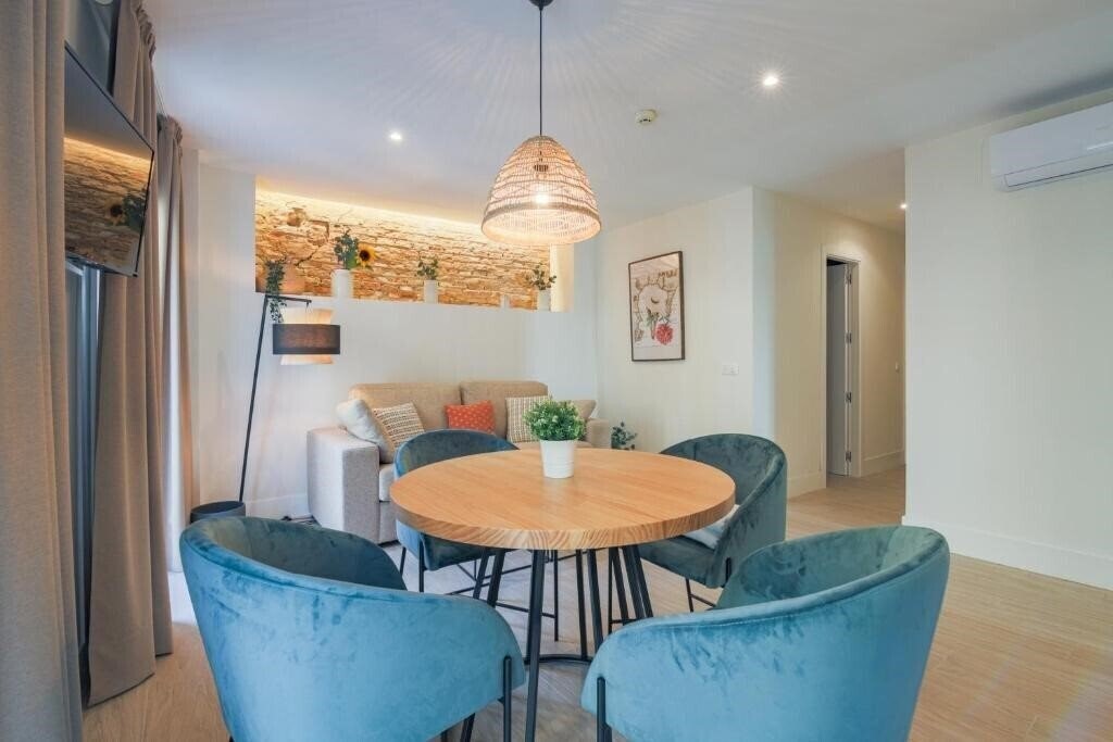 Фотография Magna Sevilla Apartamentos 3*