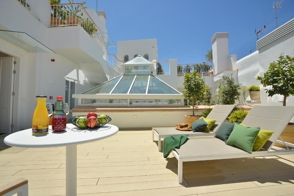 Отель Plaza Mina Suites 3*