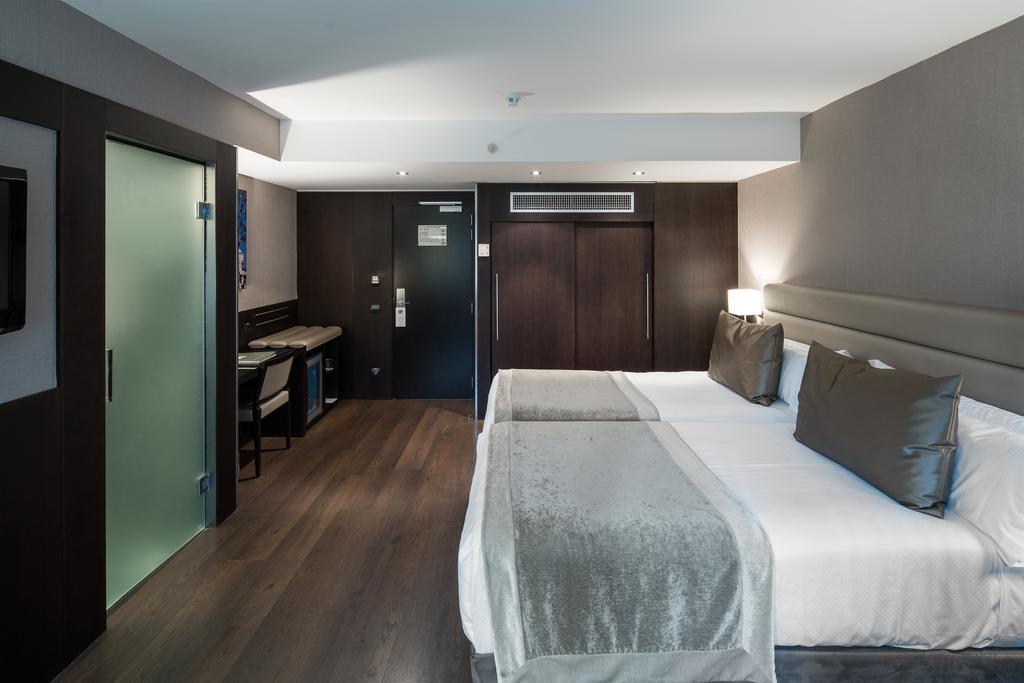 Фото Catalonia Rigoletto Hotel 4*