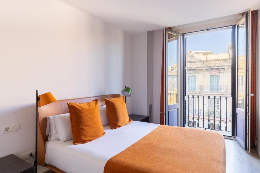 Отель Cosmo Apartments Passeig De Gracia 4*