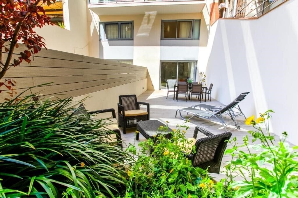 Фотография Cosmo Apartments Passeig De Gracia 4*