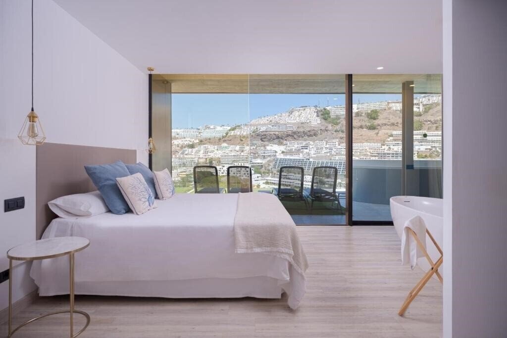 Фото The One Luxury Apartments 5*