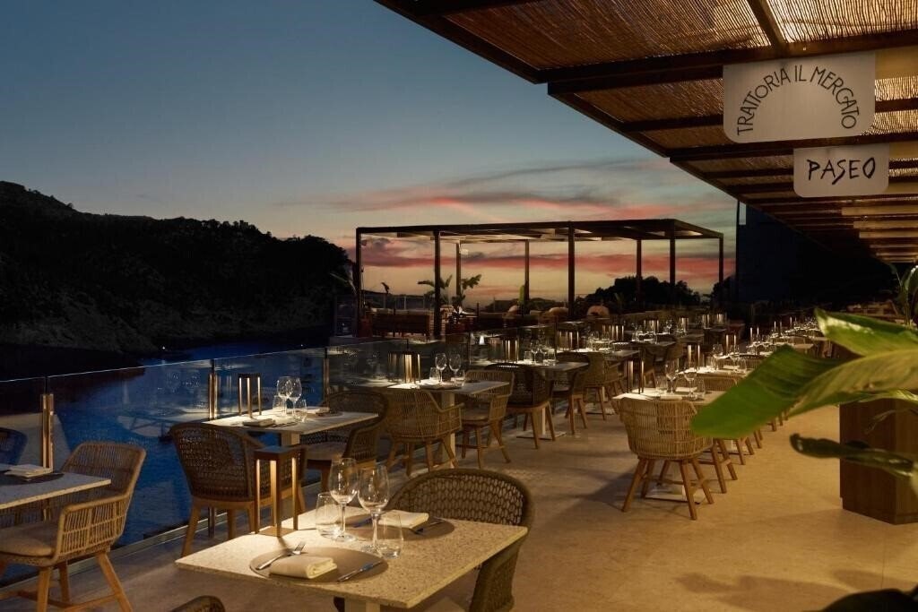 Фотография The Club Cala San Miguel Hotel Ibiza, Curio Collection by Hilton 5*