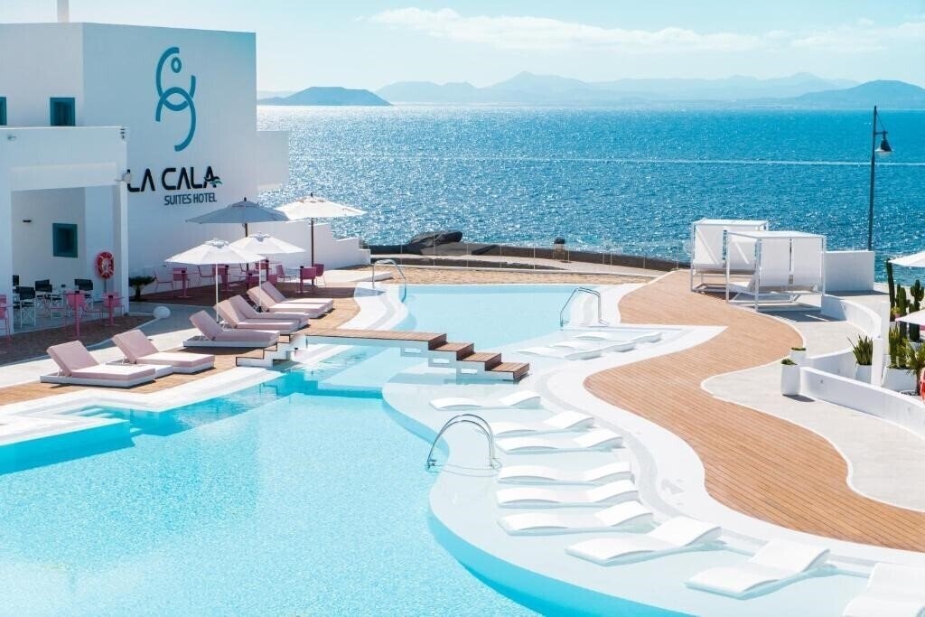 Отель La Cala Suites 5*