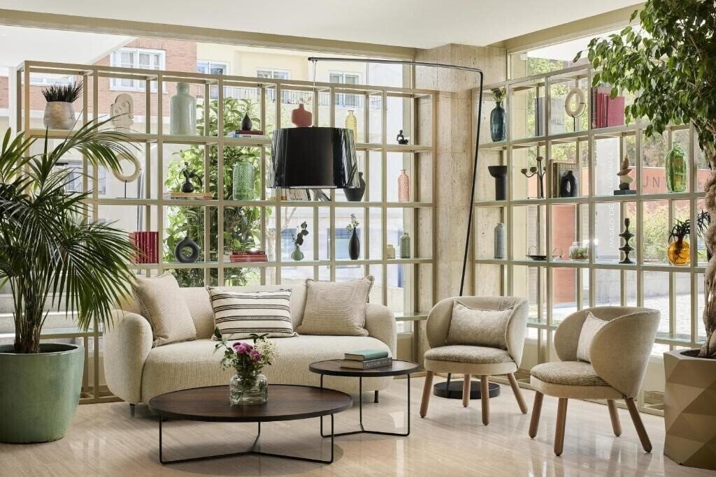 Отель NH Paseo de la Habana 4*