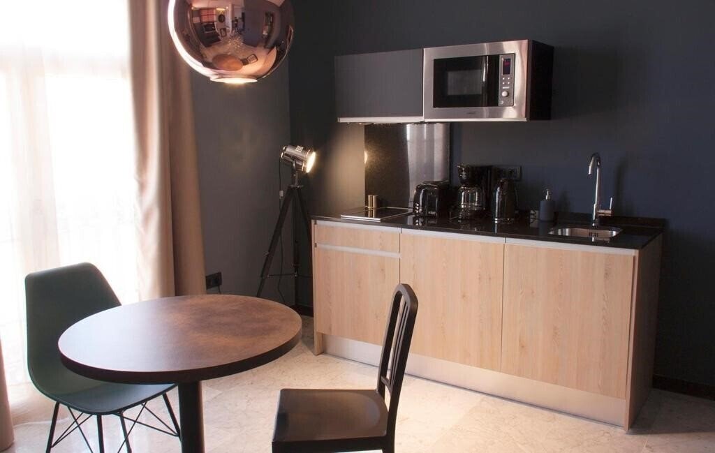 Отель Apartamentos NONO by Charming Stay 3*
