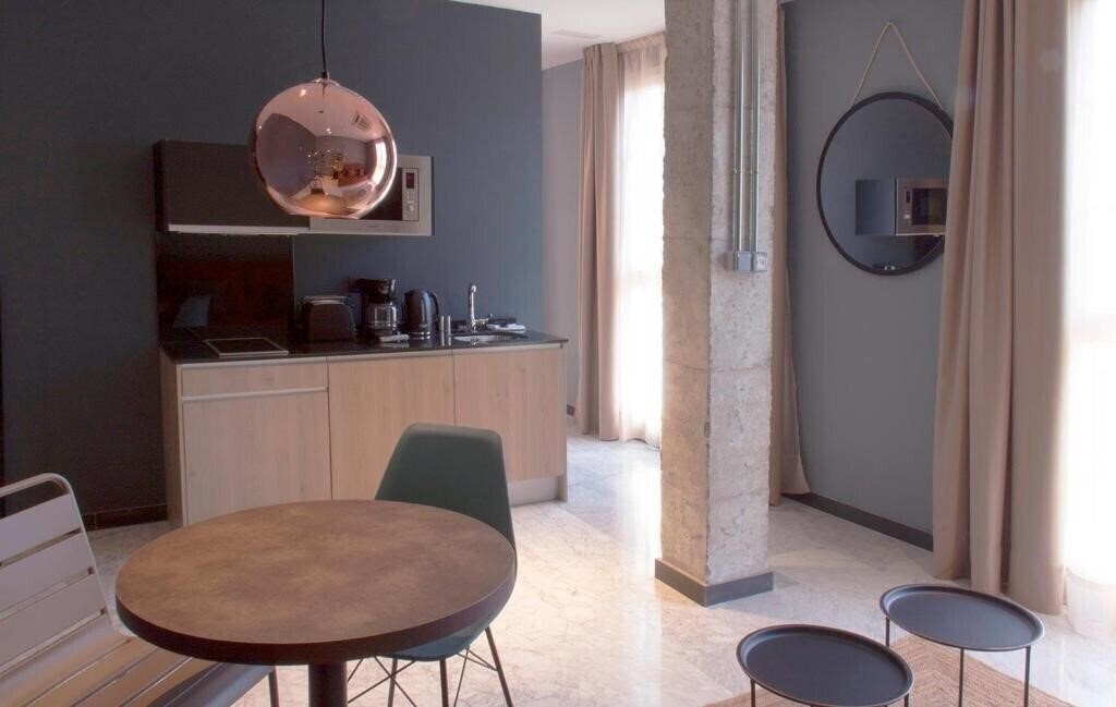Фотография Apartamentos NONO by Charming Stay 3*