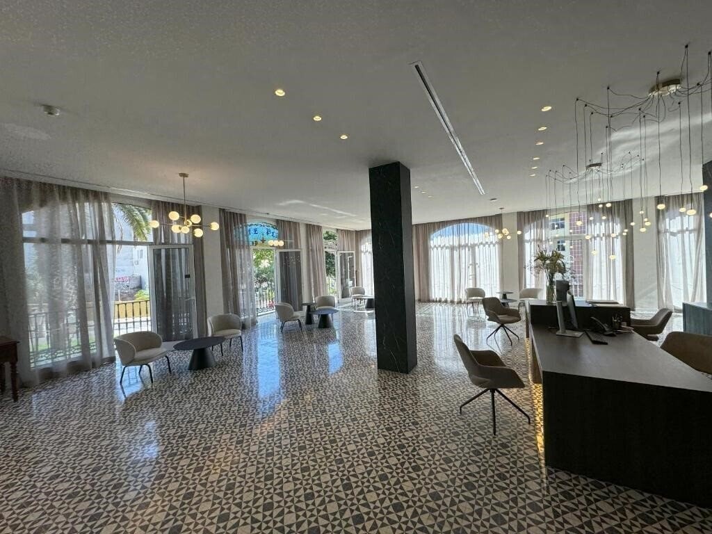 Фото Reveron Plaza 4*