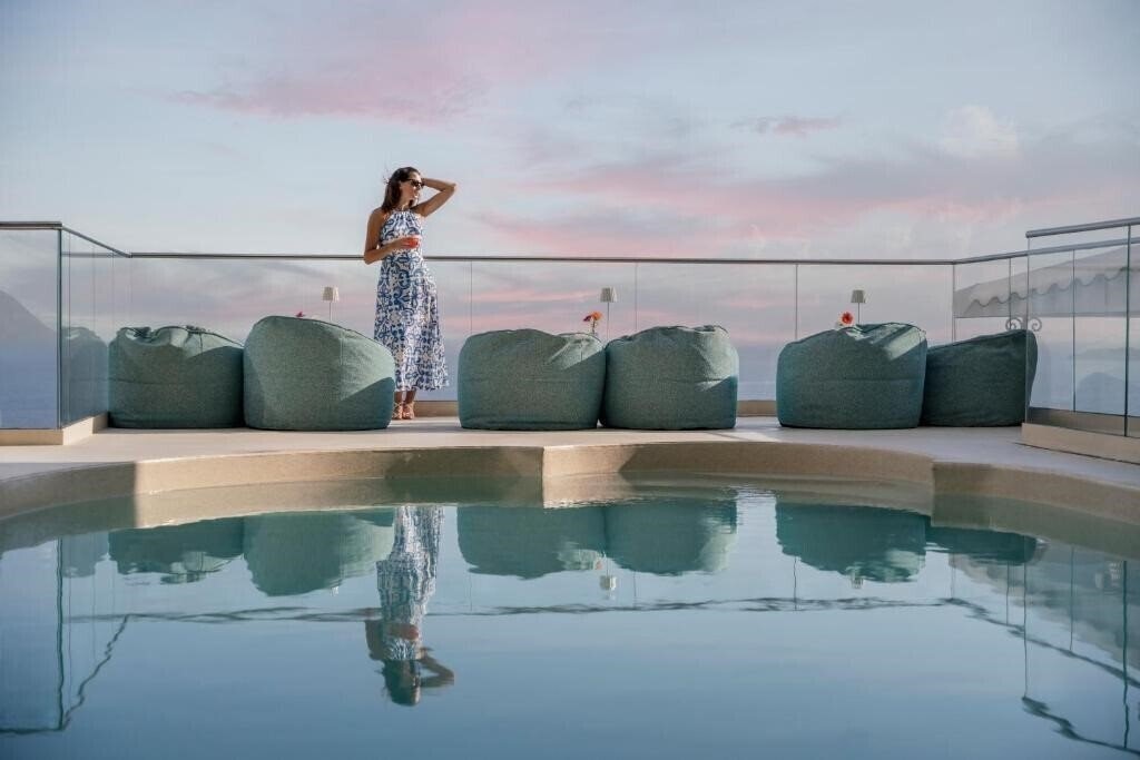 Отель Eden Roc Suites Hotel 4*