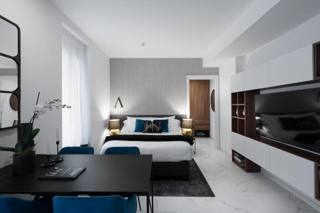 Отель Joivy Boutique Apartments Farneti 4*