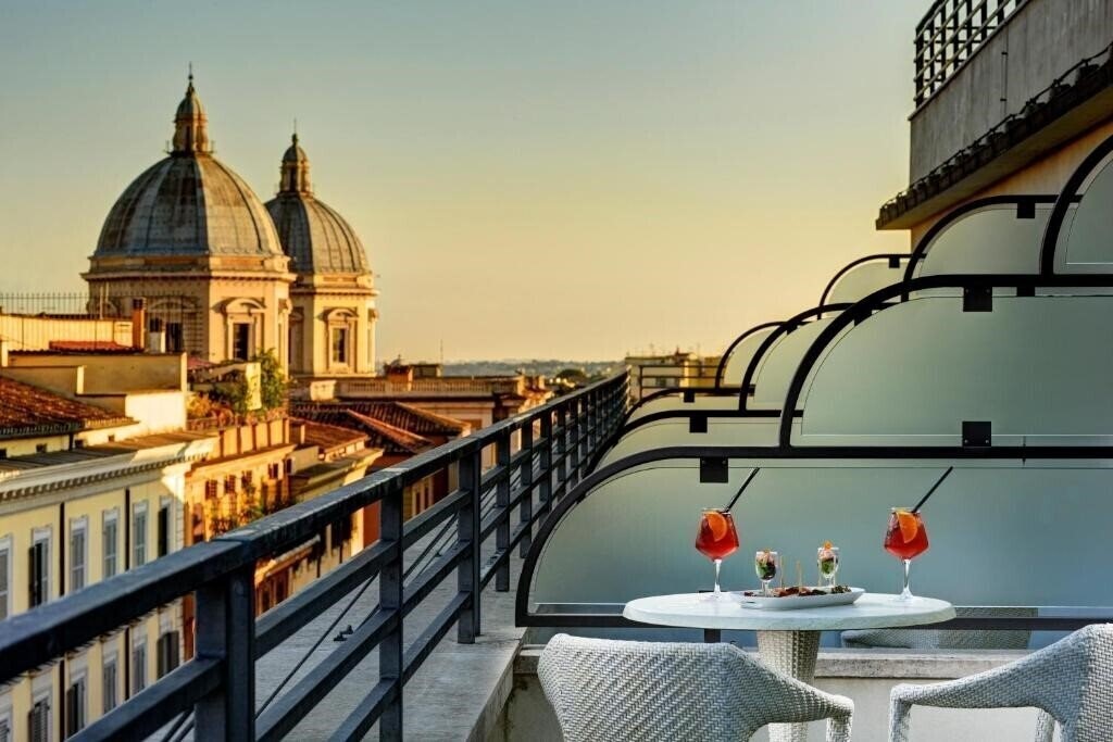 Отель Una Hotel Roma 4*