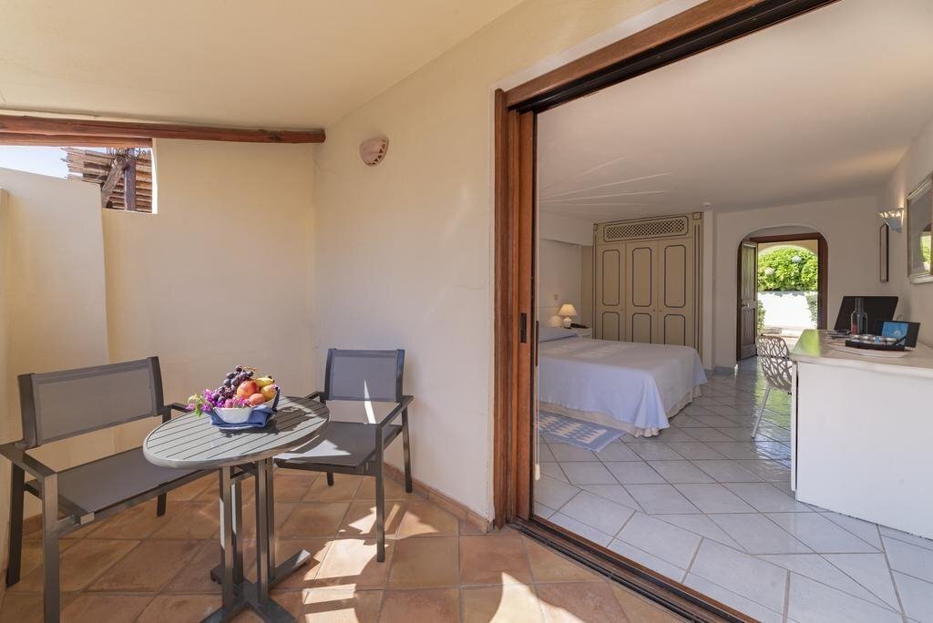 Фотография Club Hotel Baja Sardinia 4*