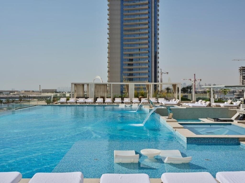 Отель The Oq Hotel 5*