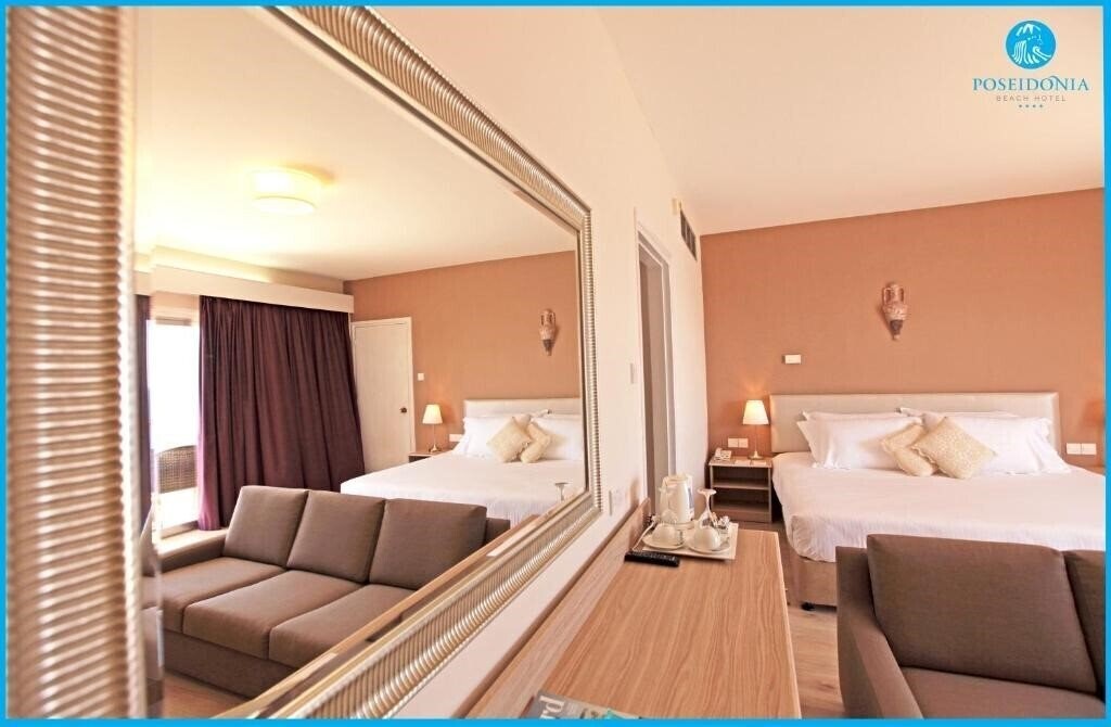 Фото Poseidonia Beach Hotel 4*