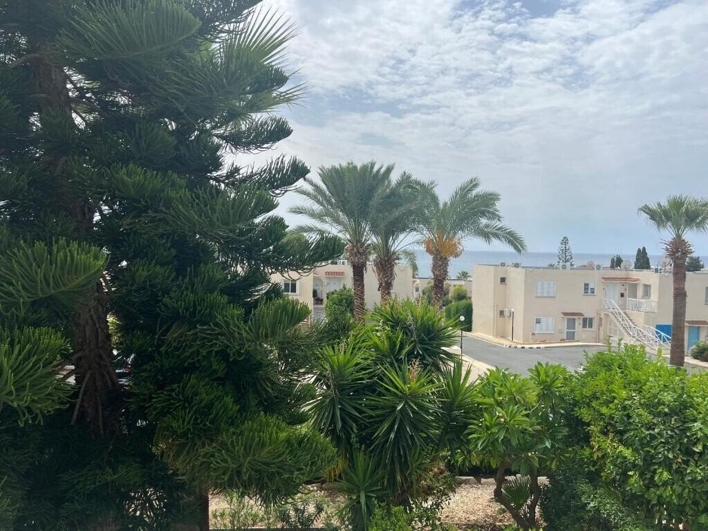 Отель Townhouse Coral Bay Village 4*