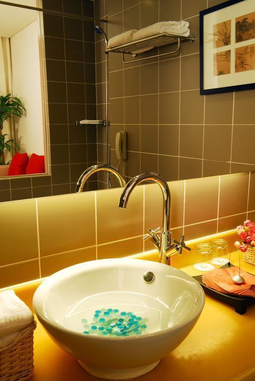 Фотография Traveler Inn Huaqiao Beijing 3*