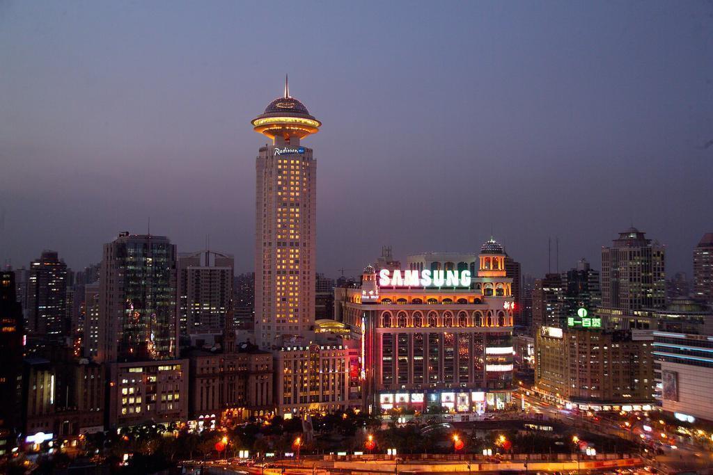 Отель Radisson Blu Hotel Shanghai New World 5*
