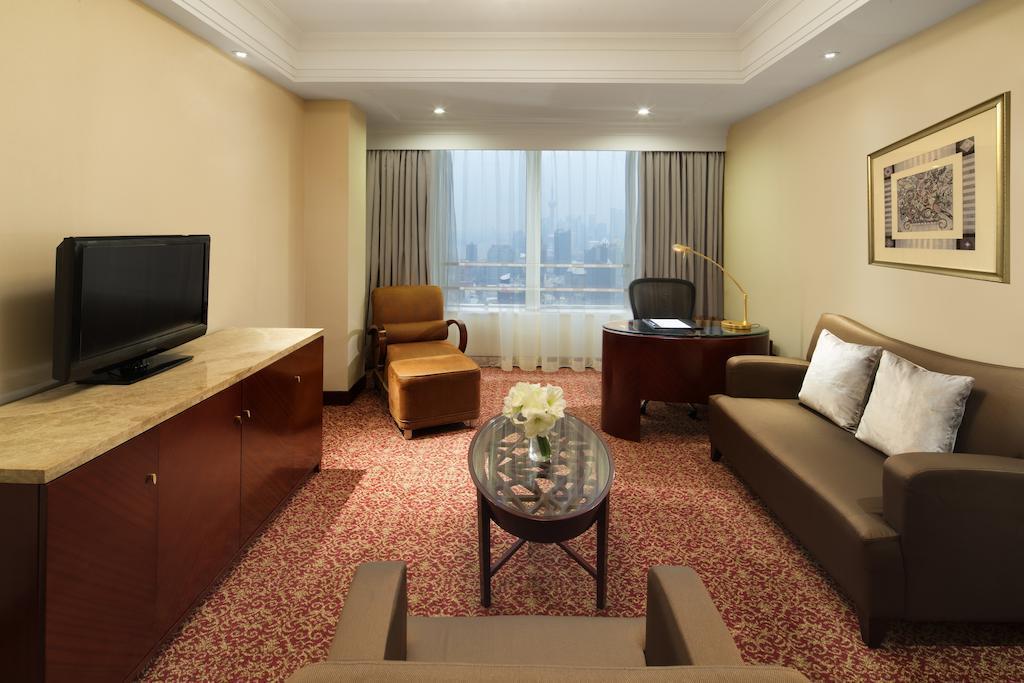 Фото Radisson Blu Hotel Shanghai New World 5*