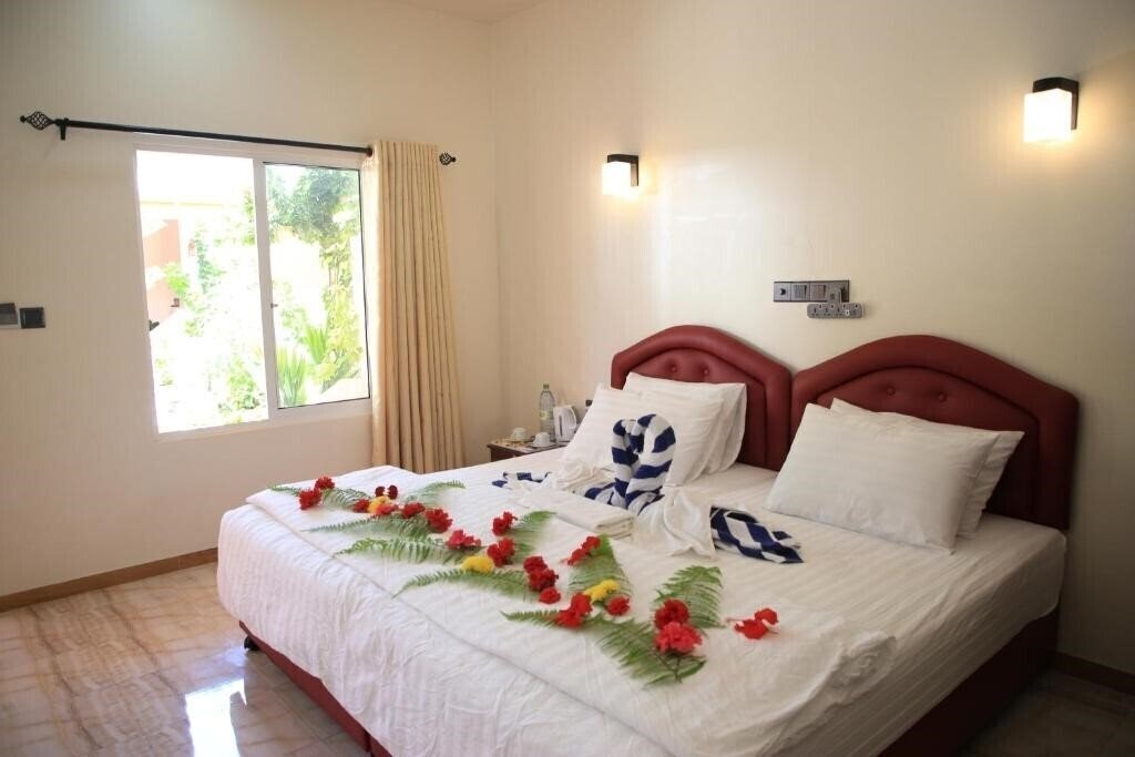 Фото Evila Inn Thoddoo 1*