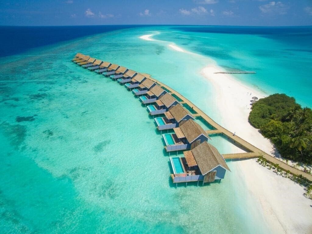 Отель Kuramathi Island Resort 4*