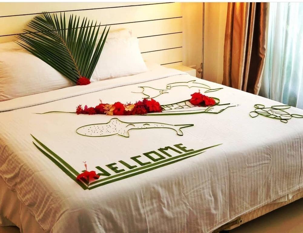 Фото Atollkey Beach Villa Dhigurah Guest House 3*