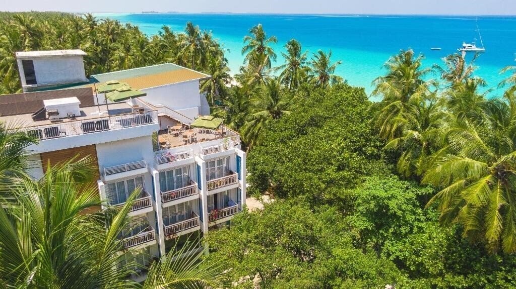 Отель Dhiguveli Maldives Guest House 3*