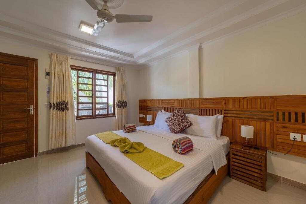Фото Kamadhoo Inn Guest House гостиный двор