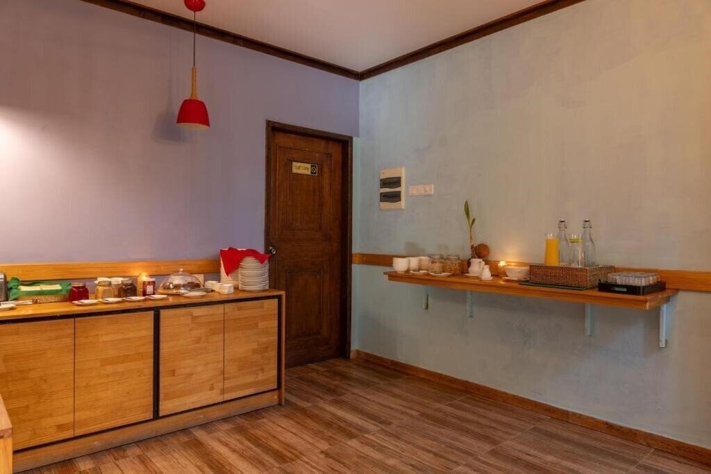 Фотография Kamadhoo Inn Guest House гостиный двор