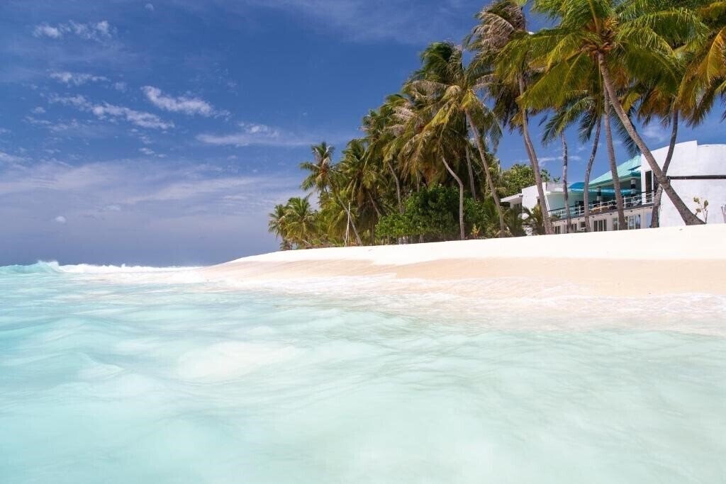 Отель Dhonfulhafi Beach View & Spa Guest House гостиный двор