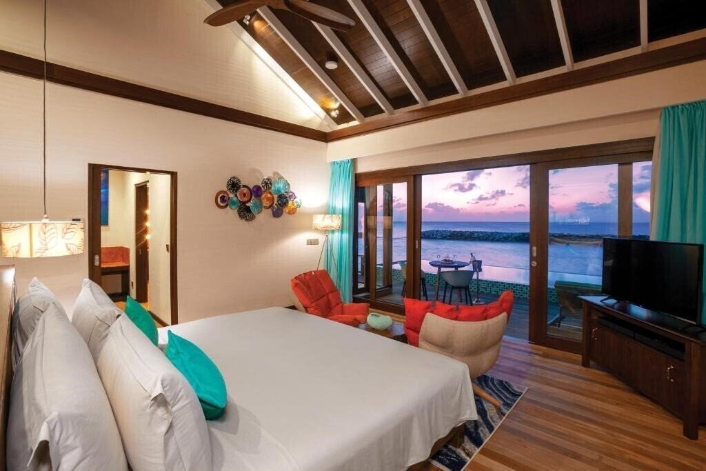 Картинка Atmosphere Kanifushi Maldives 5*