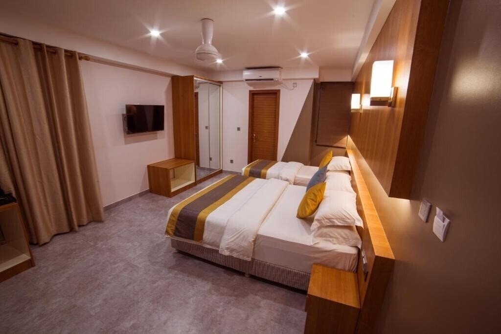 Фотография Kuredhi Beach Inn 3*