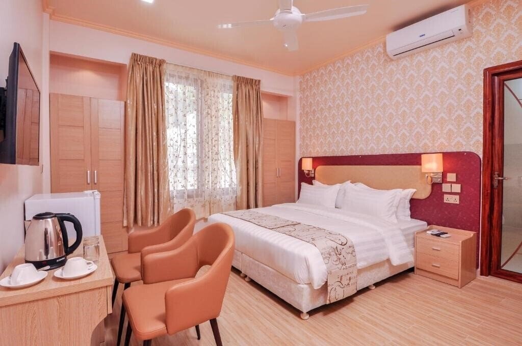 Фото Sunrise Beach Guest House 3*