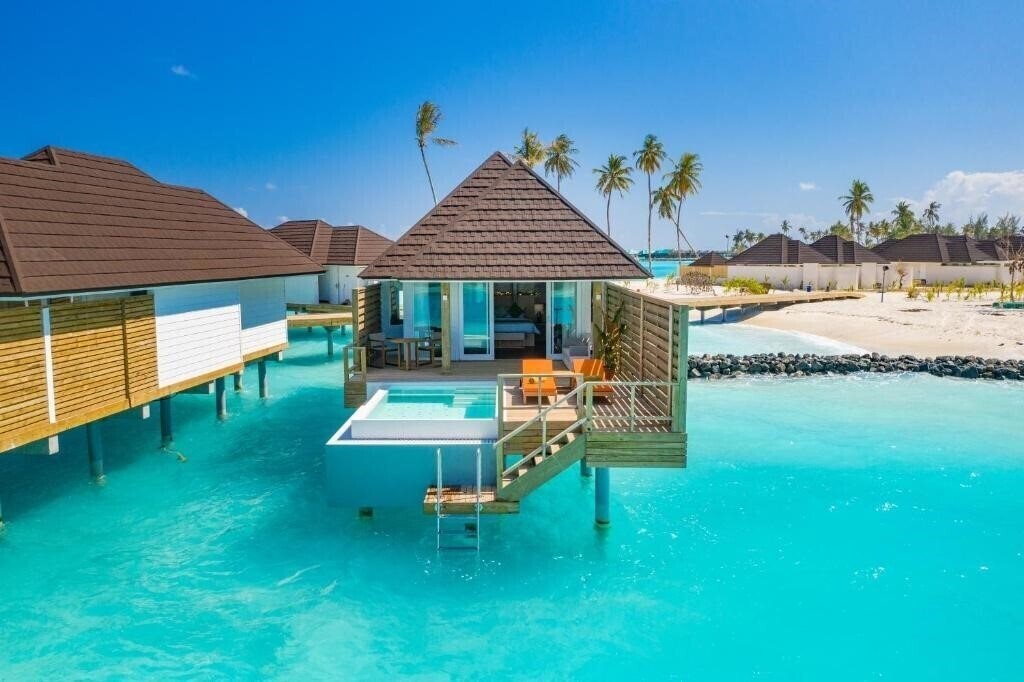 Отель Olhuveli Beach & Spa Resort 4*