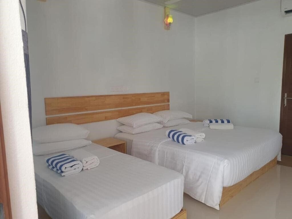 Картинка Summer Sky Thoddoo Guest House гостиный двор