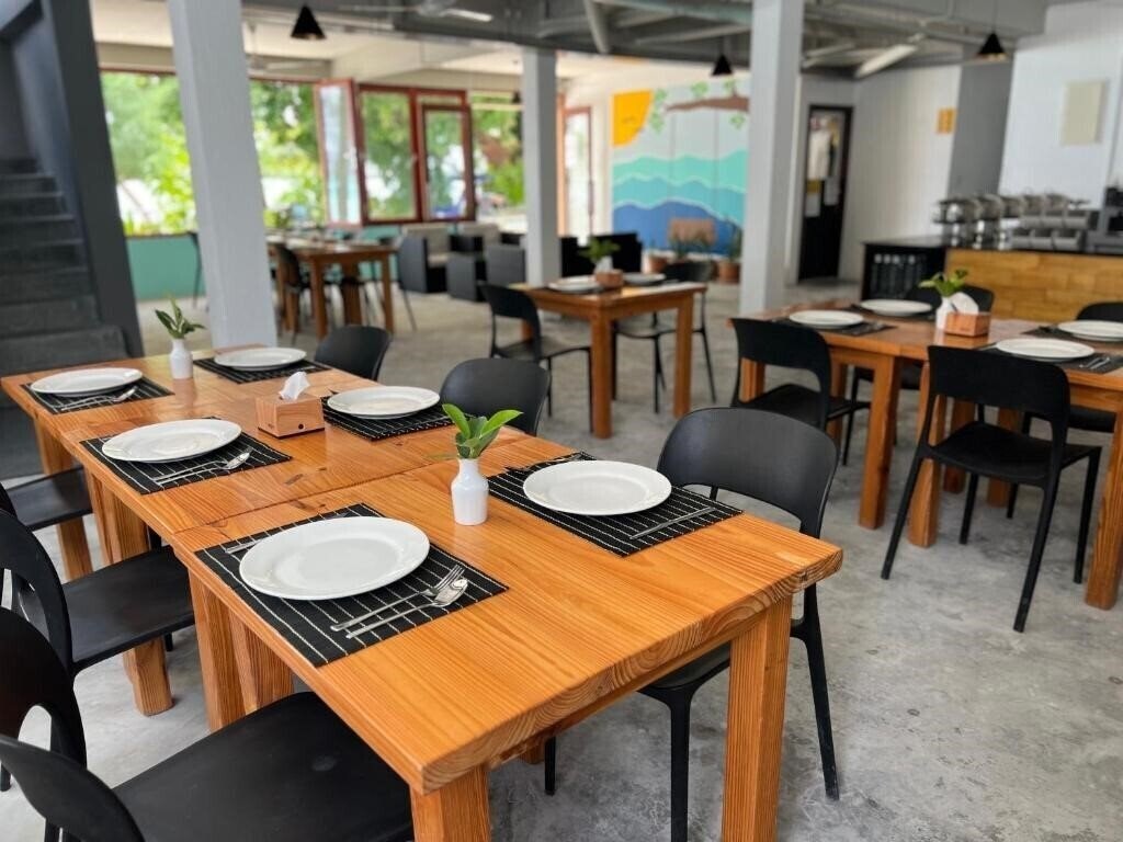 Фотография Beach House Hotel Dhiffushi Island Guest House гостиный двор