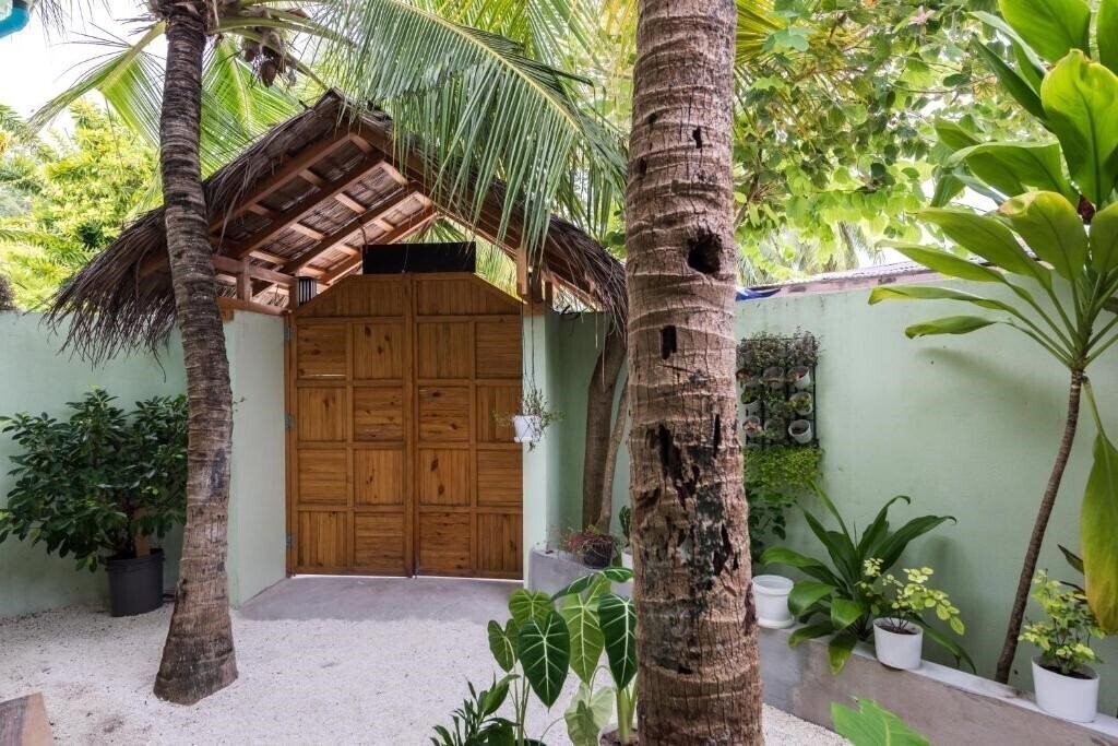 Картинка Isla Dhiffushi Guest House гостиный двор