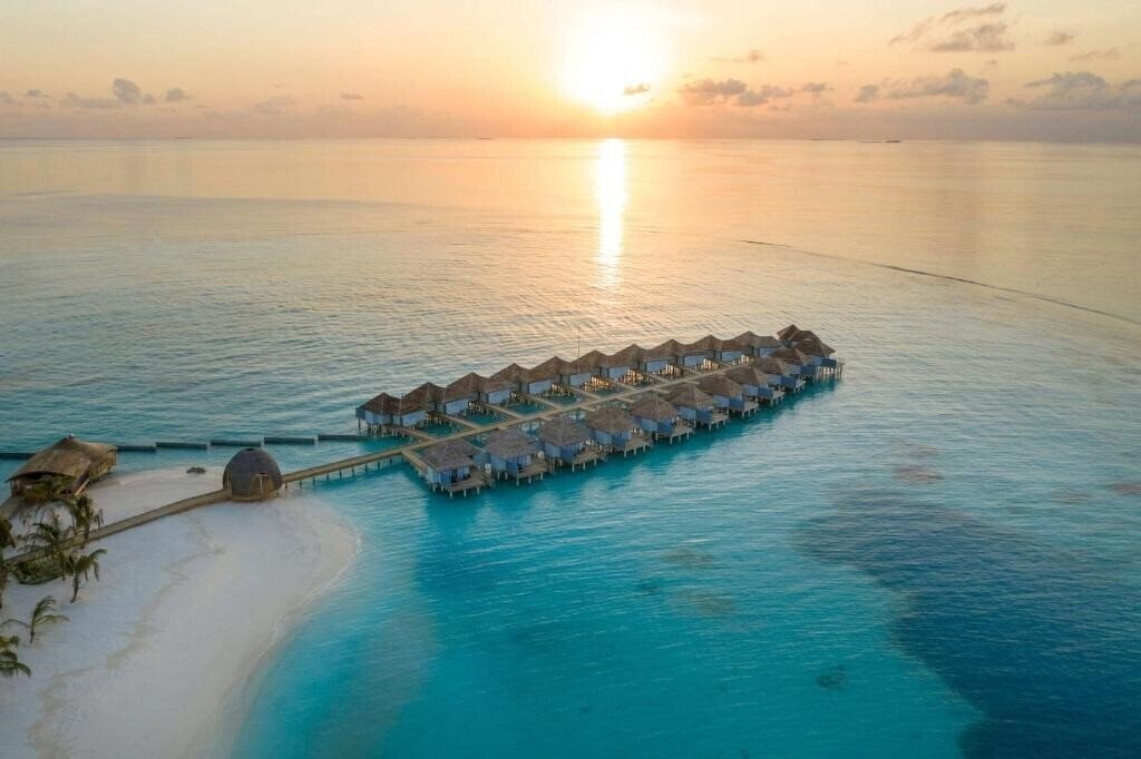 Фотография Outrigger Maldives Maafushivaru Resort 5*