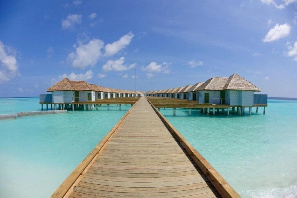 Картинка Outrigger Maldives Maafushivaru Resort 5*