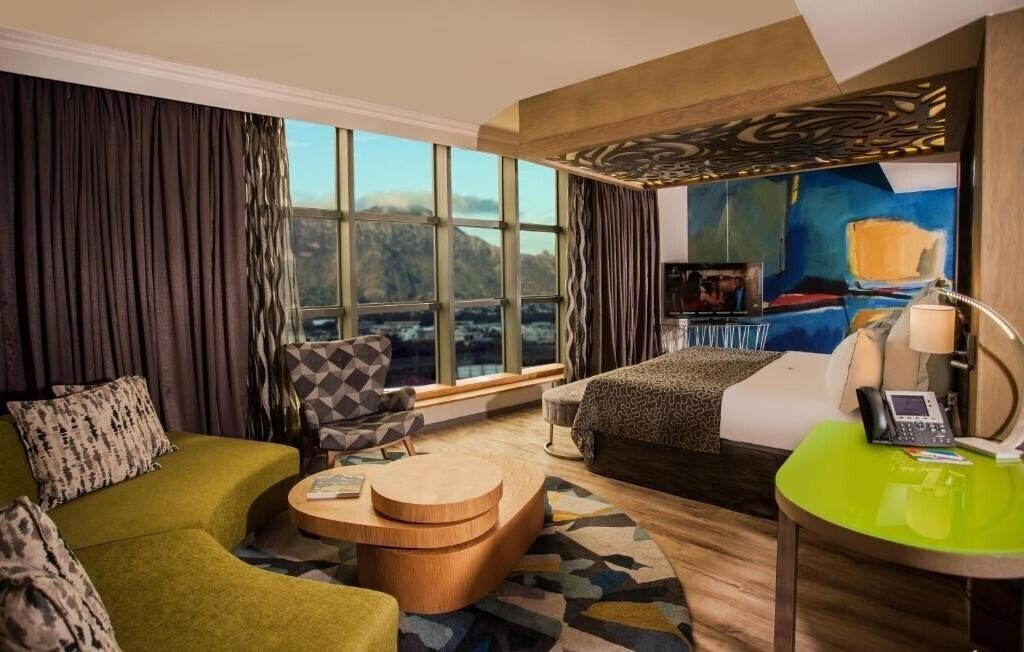 Отель Hennessy Park Hotel 4*