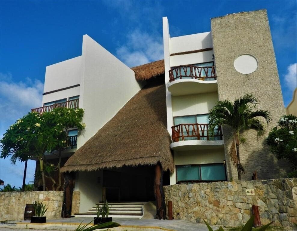 Фото Quinto Sole Boutique Hotel Mahahual (ex. Hotel Quinto Sole) 4*