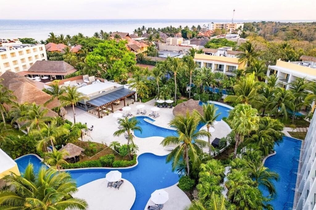 Отель Secrets Aura Cozumel 4*