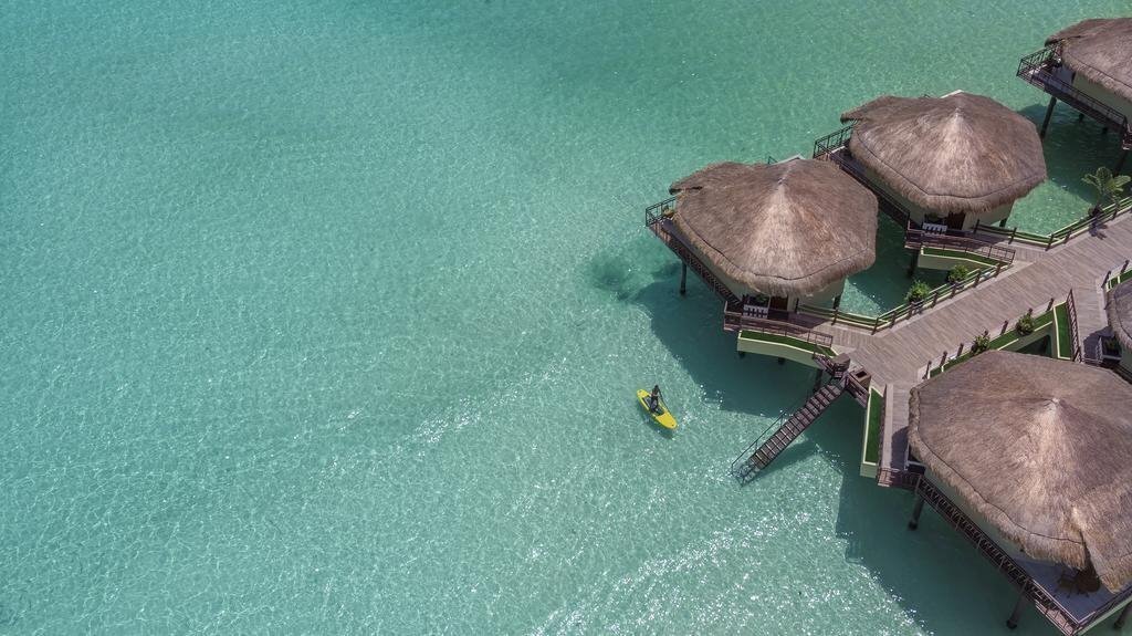 Фотография Palafitos Overwater Bungalows, By Karisma 5*