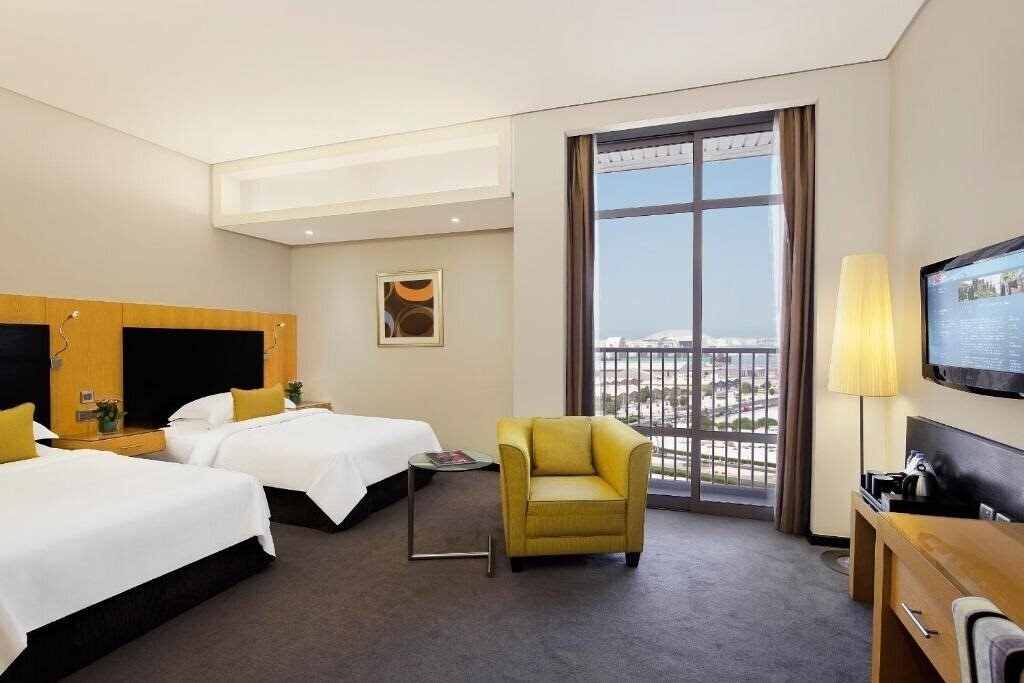 Отель Hala Arjaan By Rotana 4*