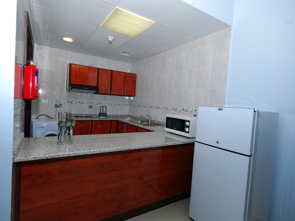 Картинка Ramee Rose Hotel Apartments Abu Dhabi 1*